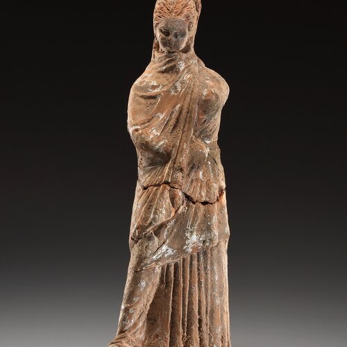 A Robed Female Statuette (Tanagra Figurine)