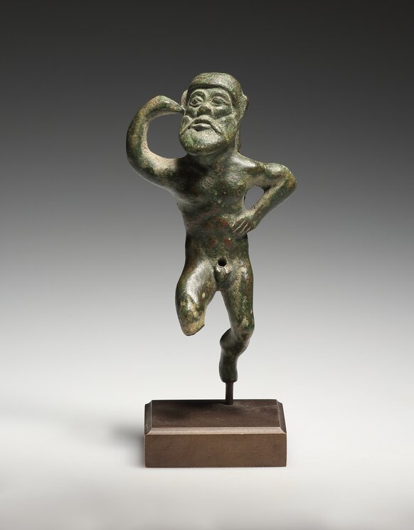 A Statuette of a Dancing Satyr